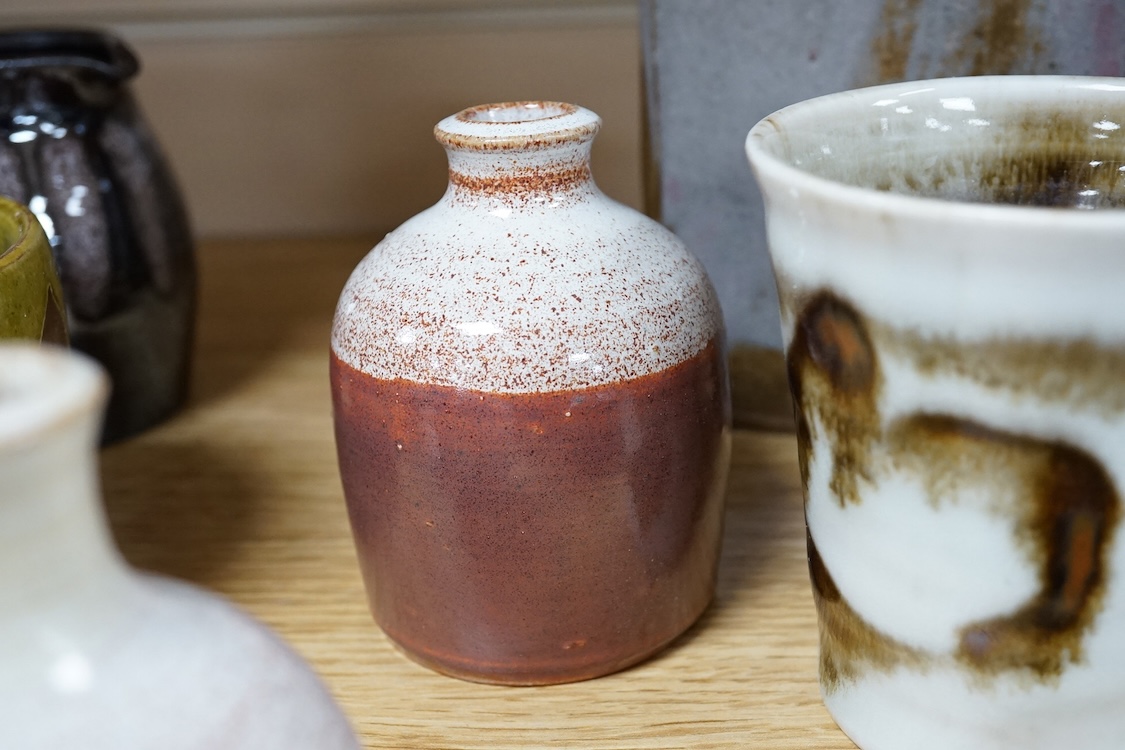 A collection of studio pottery to include a Celtic pottery Newlyn goblet, various jugs and bowls, largest 19cm high